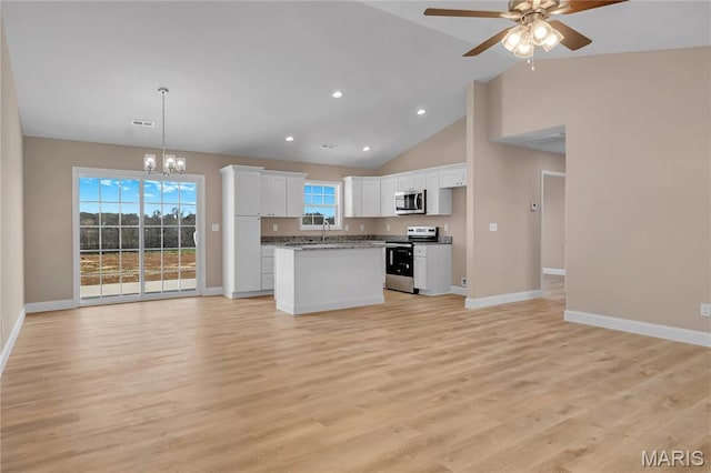 8 Bluebell Way, Jackson, MO 63755 - kitchen with stainless steel appliances, open floor plan, white cabinets, ceiling fan, and recessed lighting