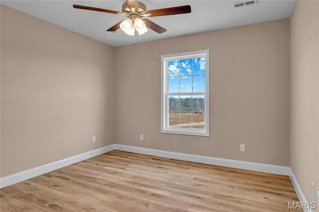 8 Bluebell Way, Jackson, MO 63755 - unfurnished room featuring a ceiling fan, baseboards, and light wood finished floors