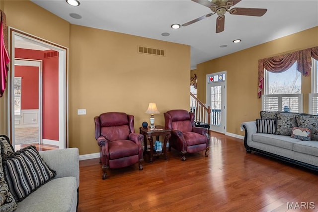 4349 Murdoch Ln, Augusta, MO 63332 - living area with wood finished floors, ceiling fan, baseboards, and recessed lighting