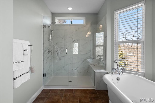 4349 Murdoch Ln, Augusta, MO 63332 - full bath with a marble finish shower, a freestanding bath, and baseboards