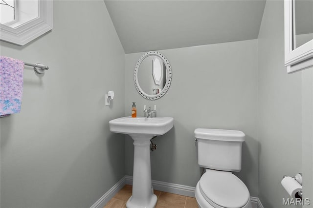 4349 Murdoch Ln, Augusta, MO 63332 - bathroom with vaulted ceiling, tile patterned floors, toilet, and baseboards
