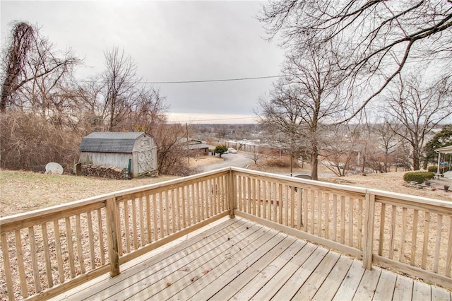 429 Oak St, East Alton, IL 62024 - wooden deck with a storage shed and an outdoor structure