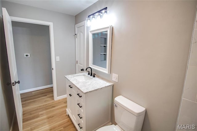 429 Oak St, East Alton, IL 62024 - bathroom with vanity and wood finished floors