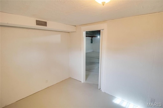 429 Oak St, East Alton, IL 62024 - unfurnished room featuring concrete floors