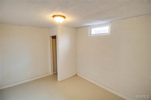 429 Oak St, East Alton, IL 62024 - below grade area featuring a textured ceiling