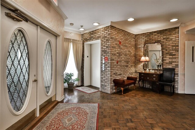 11920 Old Ballas Rd Unit 202, Saint Louis, MO 63141 - entrance foyer with healthy amount of natural light, brick wall, crown molding, and baseboards
