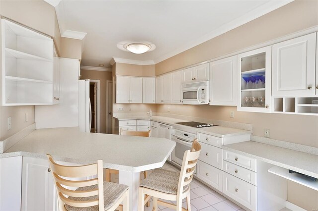 11920 Old Ballas Rd Unit 202, Saint Louis, MO 63141 - kitchen featuring white appliances, open shelves, ornamental molding, a kitchen bar, and white cabinetry