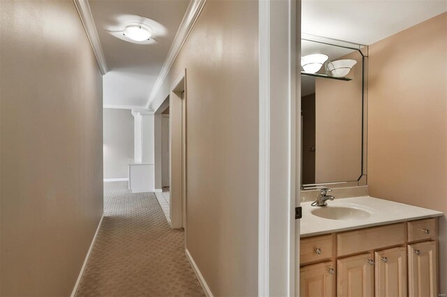 11920 Old Ballas Rd Unit 202, Saint Louis, MO 63141 - hall featuring a sink, crown molding, and baseboards