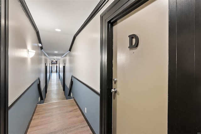 1052 S Kingshighway Blvd, Saint Louis, MO 63110 - hallway with recessed lighting, light wood finished floors, baseboards, and ornamental molding