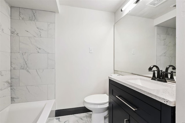 1052 S Kingshighway Blvd, Saint Louis, MO 63110 - bathroom featuring marble look tile flooring, toilet, and vanity