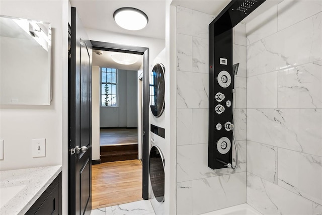 1052 S Kingshighway Blvd, Saint Louis, MO 63110 - washroom with estacked washer and dryer