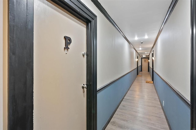 1052 S Kingshighway Blvd, Saint Louis, MO 63110 - hallway featuring light wood-style floors