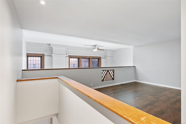 1052 S Kingshighway Blvd, Saint Louis, MO 63110 - hall featuring wood finished floors and baseboards