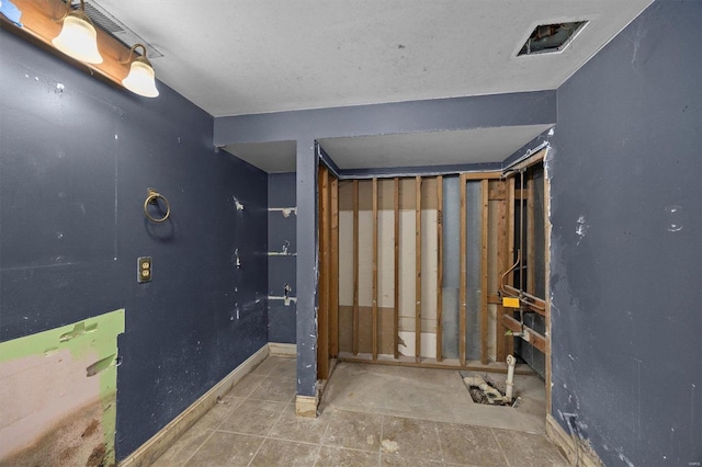 bathroom with baseboards