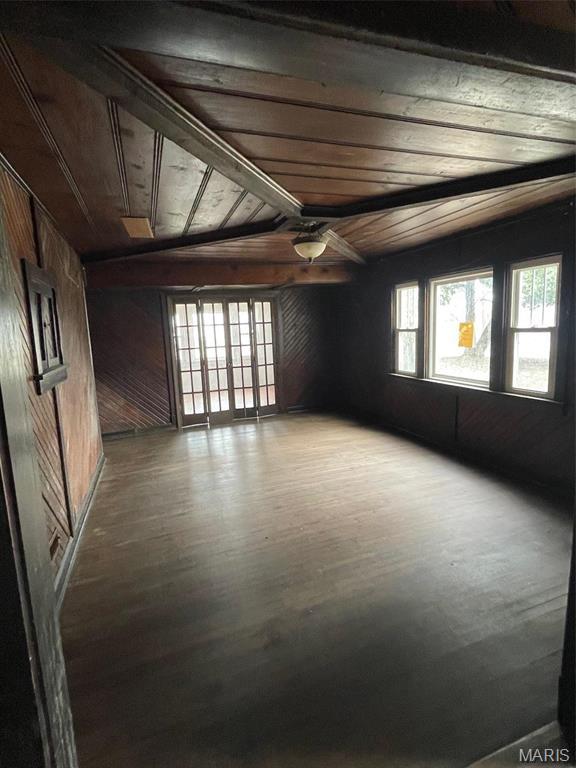 12255 Benham Rd, Saint Louis, MO 63138 - unfurnished room featuring wood ceiling, wooden walls, wood finished floors, and ceiling fan