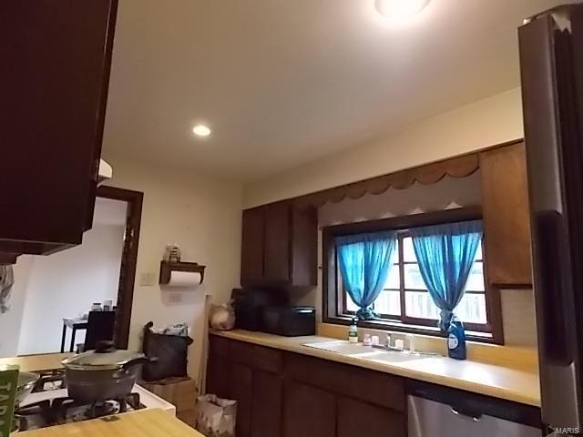 109 E Hicks, Cardwell, MO 63829 - kitchen featuring light countertops, dishwasher, and recessed lighting