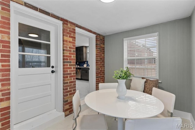 5807 Columbia Ave, Saint Louis, MO 63139 - dining space with brick wall and marble finish flooring