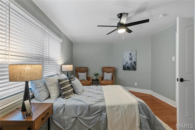 5807 Columbia Ave, Saint Louis, MO 63139 - bedroom featuring wood finished floors, baseboards, and ceiling fan