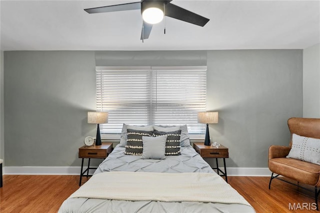 5807 Columbia Ave, Saint Louis, MO 63139 - bedroom featuring wood finished floors, baseboards, and ceiling fan
