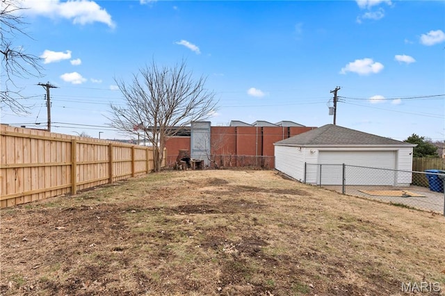 5807 Columbia Ave, Saint Louis, MO 63139 - fenced backyard with a detached garage and an outbuilding