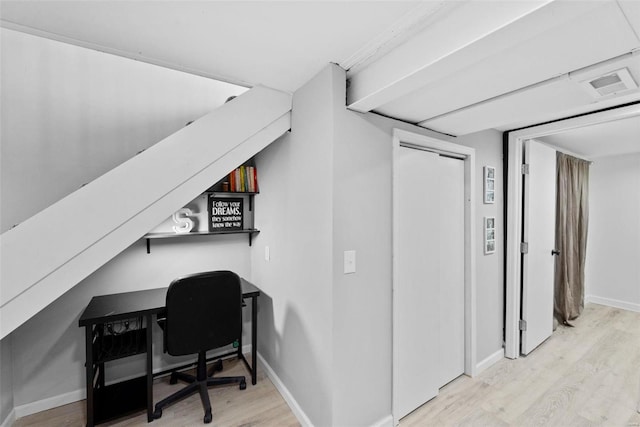 office space featuring wood finished floors and baseboards