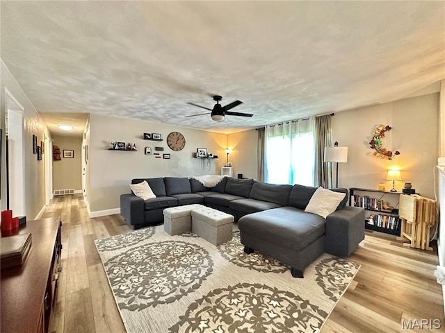 6 Ravenwood Cir, Ofallon, IL 62269 - living room with light wood-style floors, ceiling fan, and baseboards