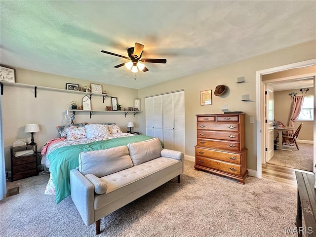 6 Ravenwood Cir, Ofallon, IL 62269 - bedroom featuring light colored carpet, a closet, a ceiling fan, and baseboards