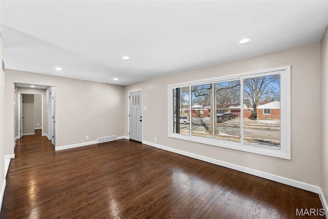8646 Spoon Dr, Saint Louis, MO 63132 - entrance foyer with baseboards, dark wood-style flooring, and recessed lighting