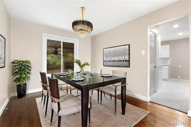 8646 Spoon Dr, Saint Louis, MO 63132 - dining space with a chandelier, baseboards, light wood-type flooring, and recessed lighting