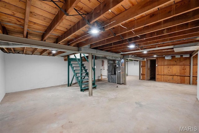 8646 Spoon Dr, Saint Louis, MO 63132 - basement with heating unit and stairway