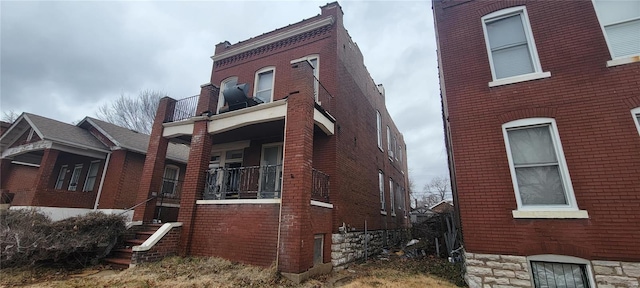 1047 Hornsby Ave, Saint Louis, MO 63147 - view of property exterior with brick siding