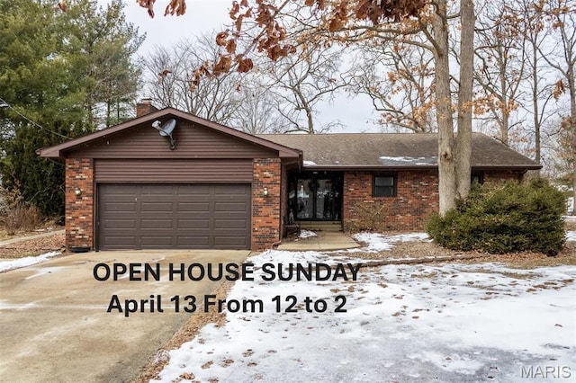 3 Echo Ln, Centralia, IL 62801 - view of front of house featuring brick siding, a garage, concrete driveway, and a chimney