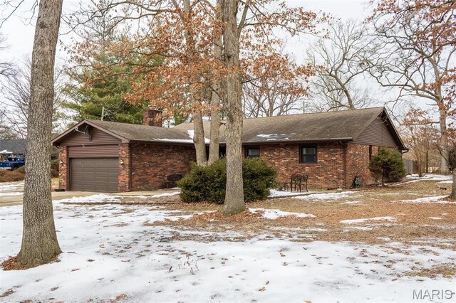 3 Echo Ln, Centralia, IL 62801 - ranch-style home featuring brick siding, a chimney, a garage, and a shingled roof