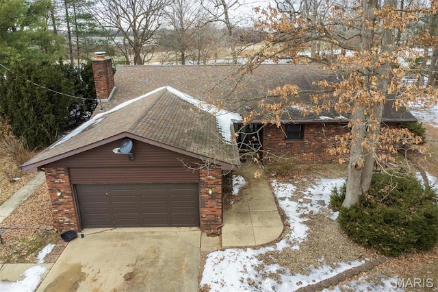 3 Echo Ln, Centralia, IL 62801 - view of front of property with brick siding, roof with shingles, a chimney, and concrete driveway