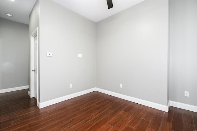 7915 S Broadway, Saint Louis, MO 63111 - spare room featuring baseboards, dark wood-style floors, a ceiling fan, and recessed lighting