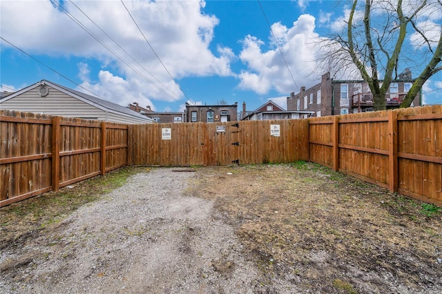 7915 S Broadway, Saint Louis, MO 63111 - fenced backyard with a gate
