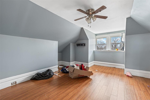5029 Wells Ave, Saint Louis, MO 63113 - additional living space with vaulted ceiling, hardwood / wood-style floors, ceiling fan, and baseboards