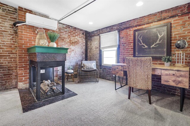 1317 Shenandoah Ave, Saint Louis, MO 63104 - carpeted office space featuring a wall unit AC, a multi sided fireplace, and brick wall