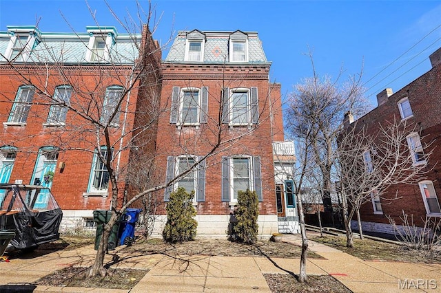 1317 Shenandoah Ave, Saint Louis, MO 63104 - victorian home with brick siding, mansard roof, and a high end roof
