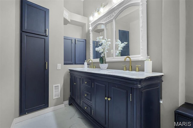 1317 Shenandoah Ave, Saint Louis, MO 63104 - full bathroom featuring marble look tiles and double vanity