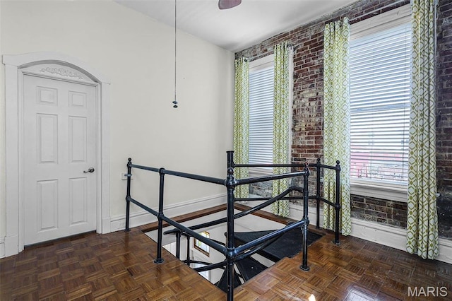 1317 Shenandoah Ave, Saint Louis, MO 63104 - staircase with brick wall
