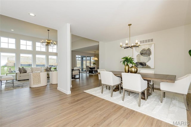 212 Terradel Trl, Foristell, MO 63348 - dining space featuring a chandelier, light wood-style floors, baseboards, and recessed lighting