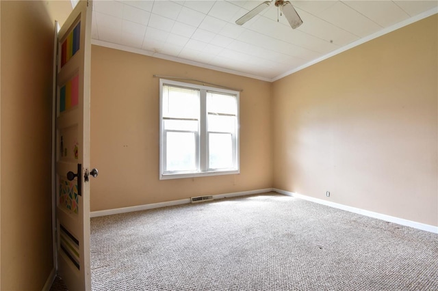 610 Panhorst St, Staunton, IL 62088 - carpeted empty room featuring ornamental molding, a ceiling fan, and baseboards