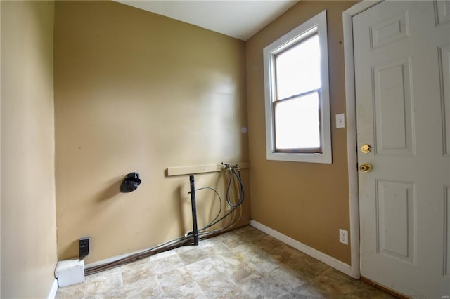 610 Panhorst St, Staunton, IL 62088 - clothes washing area with plenty of natural light, baseboards, and washer hookup