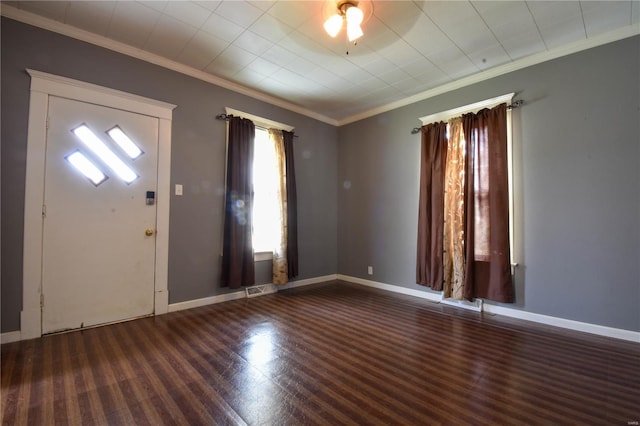 610 Panhorst St, Staunton, IL 62088 - foyer entrance featuring wood finished floors, crown molding, and baseboards