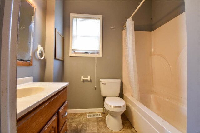 610 Panhorst St, Staunton, IL 62088 - bathroom with toilet, baseboards, vanity, and shower / bath combination with curtain
