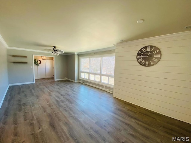 2 El Rancho Dr, Hannibal, MO 63401 - unfurnished living room featuring crown molding, ceiling fan, dark wood-style floors, and baseboards