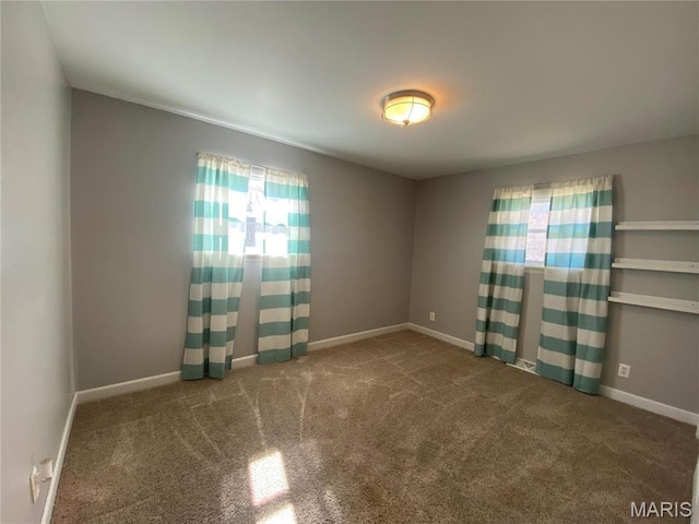 2 El Rancho Dr, Hannibal, MO 63401 - carpeted spare room featuring baseboards
