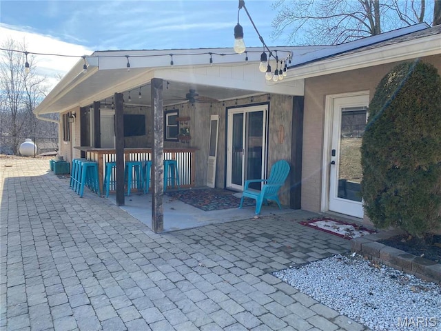 2 El Rancho Dr, Hannibal, MO 63401 - view of patio with a ceiling fan and fence