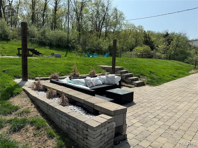 2 El Rancho Dr, Hannibal, MO 63401 - view of home's community with a patio area and an outdoor living space